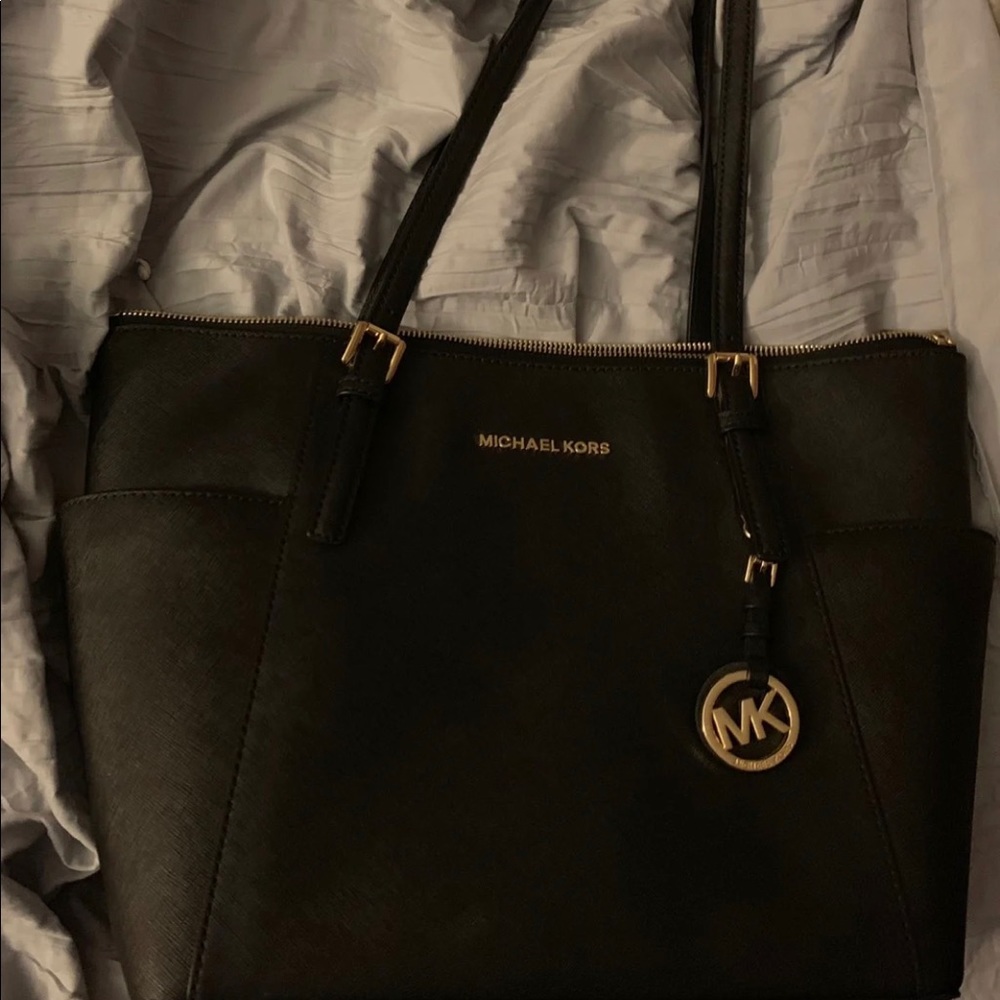Black Michael Kors bag and wallet set